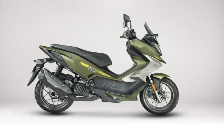 Hero Xoom 160: ১৫৬ সিসির ইঞ্জিন, বড় চাকা, ABS ও Smart Key, নতুন Scooter এ থাকছে কী কী? Hero Xoom 160 অ্যাডভেঞ্চার স্টাইলের প্রিমিয়াম Scooter, সবুজ ও কালো রঙের Body Design এবং বড় Wheel সহ।